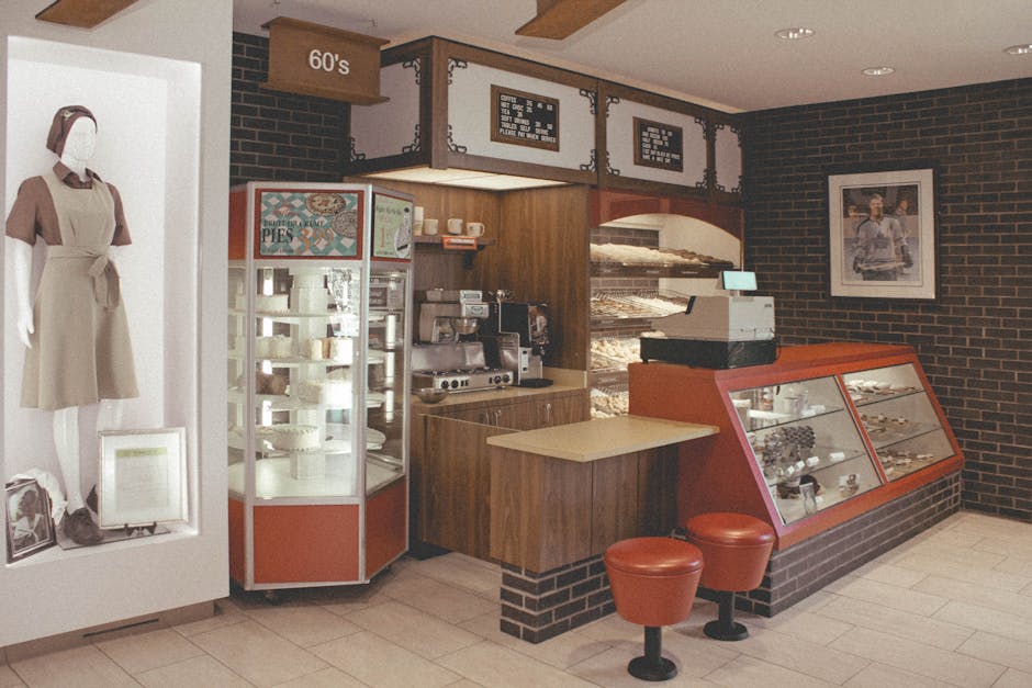 Explore a retro coffee shop with vintage decor and a mannequin display, capturing the essence of the 60s.